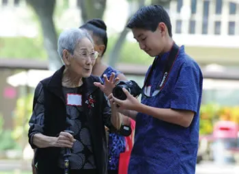 young and old interacting